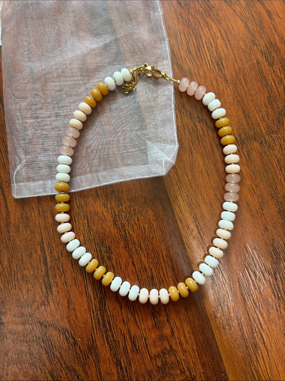 Women’s beaded necklace gold pink white neutral local artisan